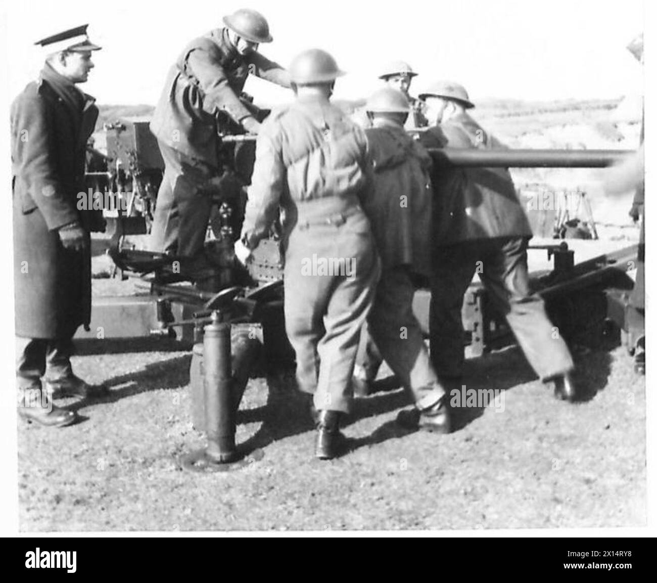 A.A. TRAINING - The gun crew changes the barrel of the Bofors AA gun
