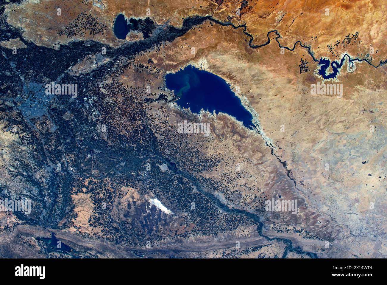 Lake land river features in the border of Iran e Iraq. Digital enhancement of an image by NASA Stock Photo