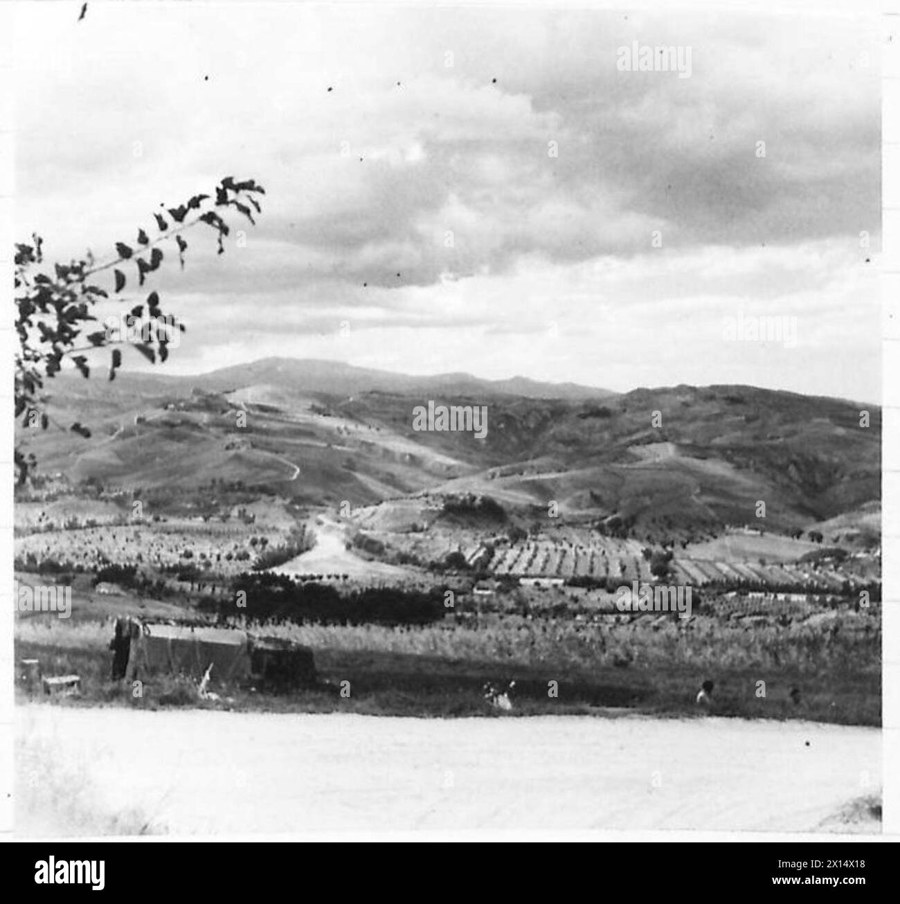 The Eighth Army advances along the Gothic Line from Monte Calvo to Monteochio. The photograph is taken near Coldazzo, showing troops moving through the fortified positions during World War II. Stock Photo