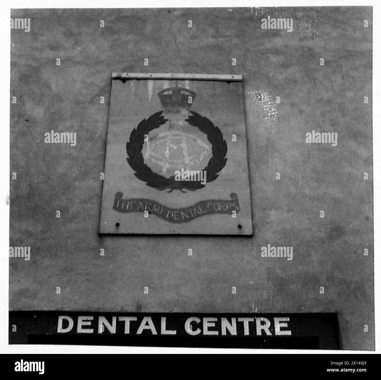 CARE OF THE ARMY S TEETH The badge of the Army Dental Corps outside a