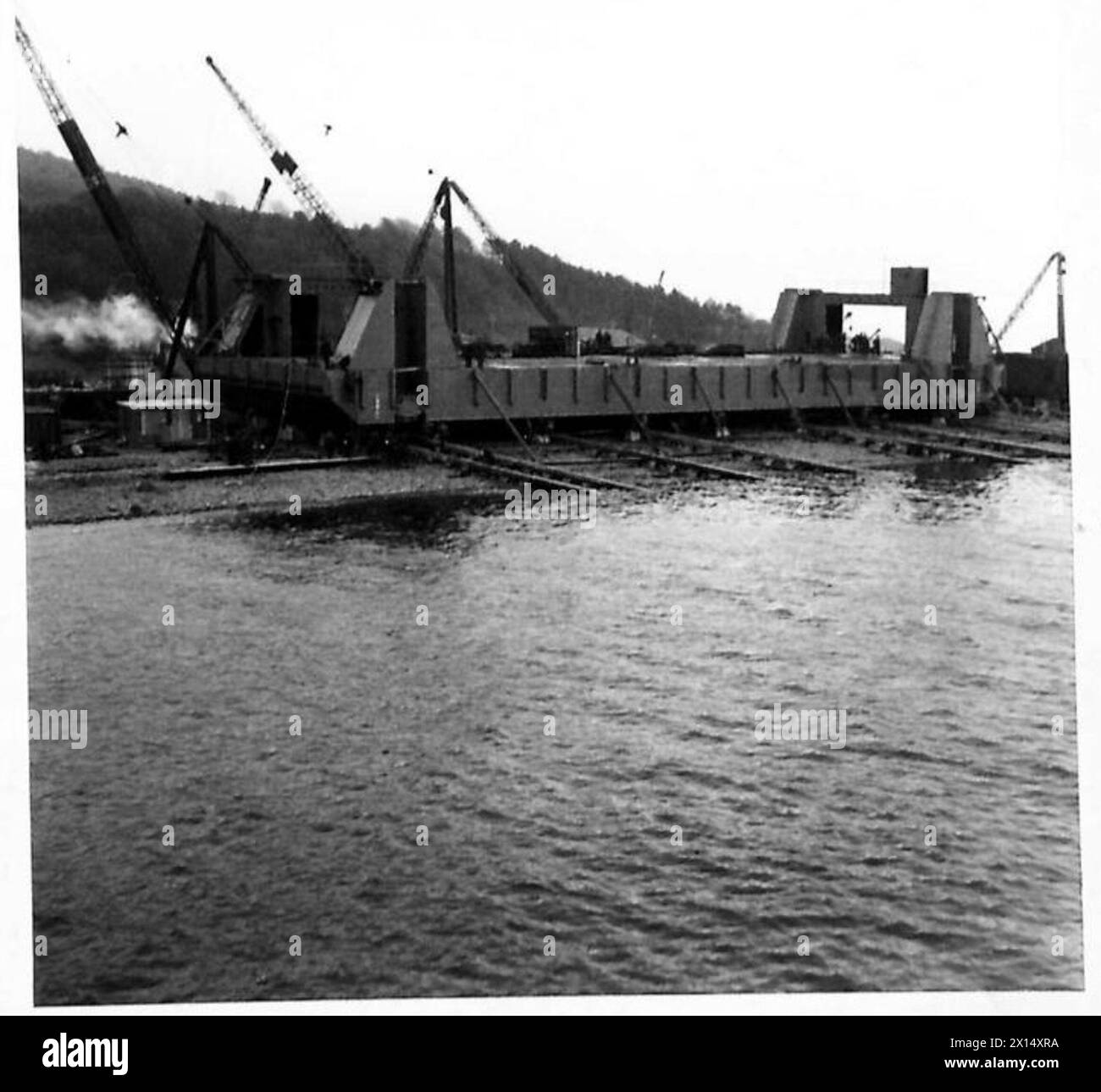 Special assignment for TN.5 documents progress on Whales and additional structures during British Army construction and engineering operations. Stock Photo