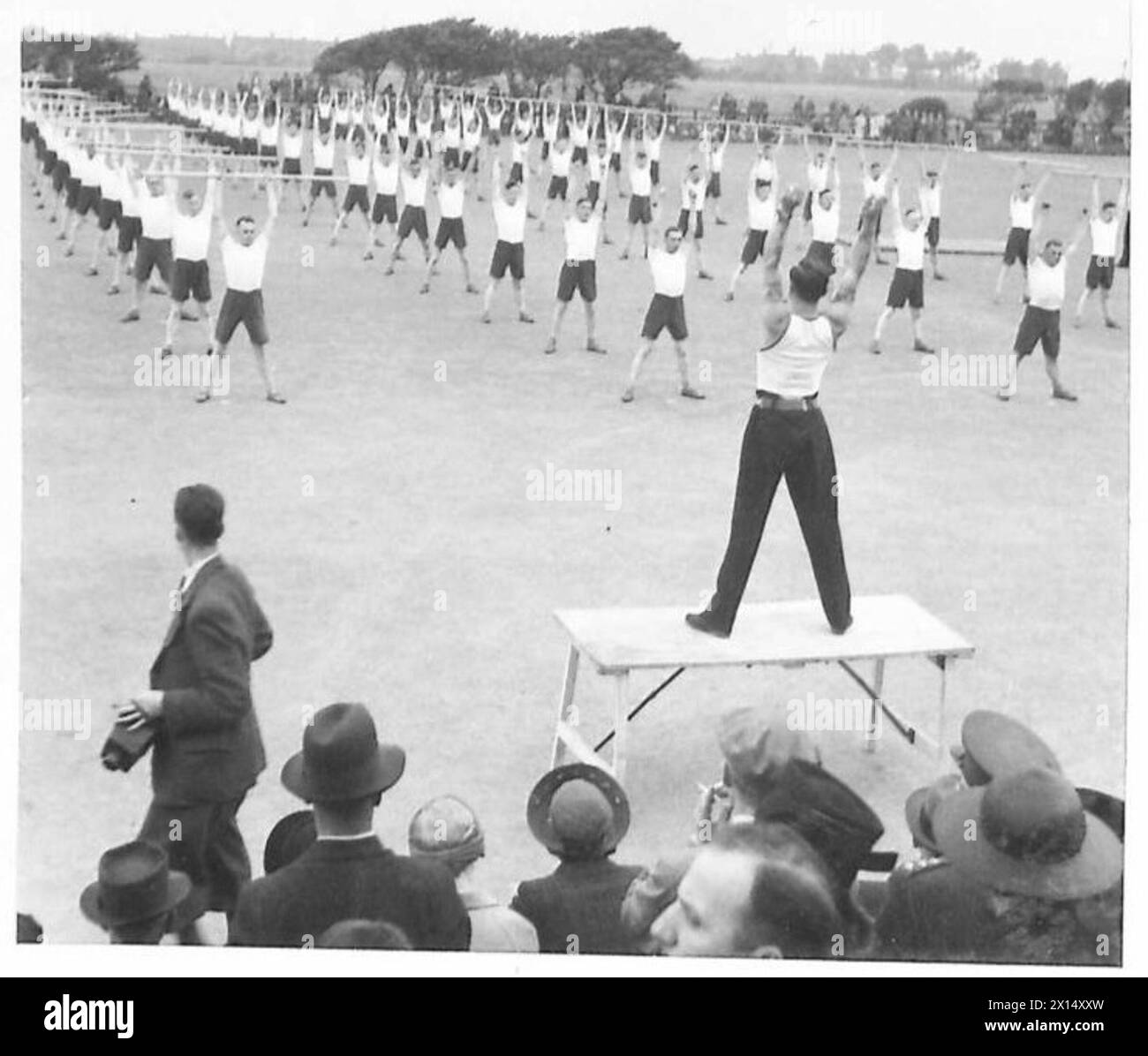Royal Artillery personnel perform physical training exercises ...
