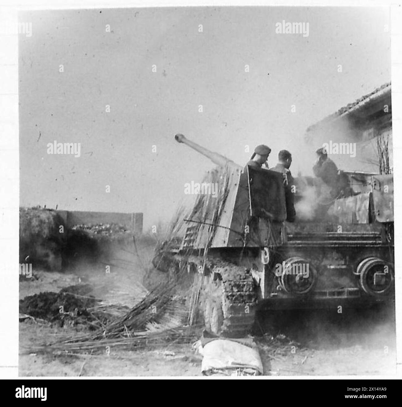 An 88 mm German self-propelled gun is operated by British forces of the Eighth Army against German positions. Stock Photo