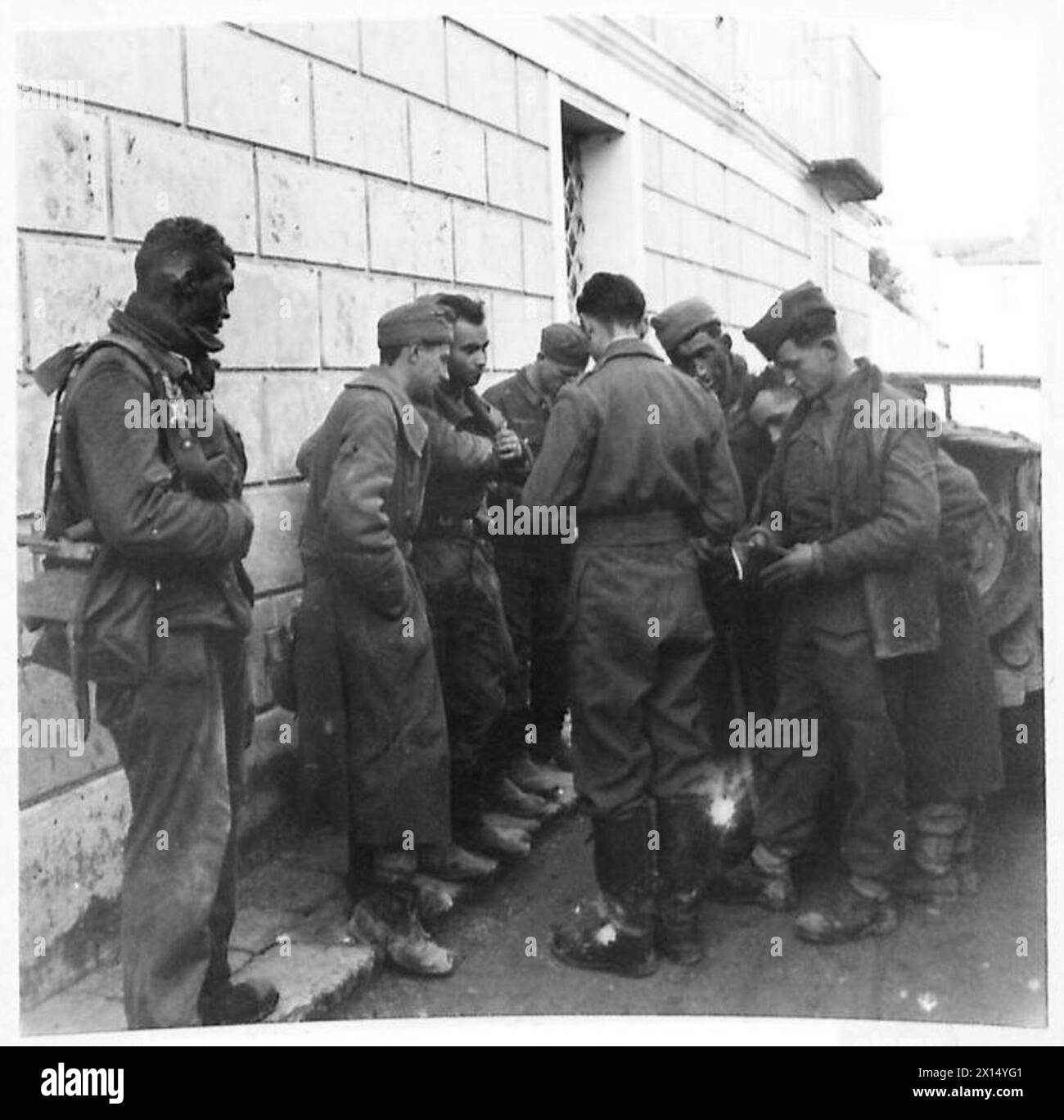 A Guards Officer interrogates Commando prisoners returning from a raid ...