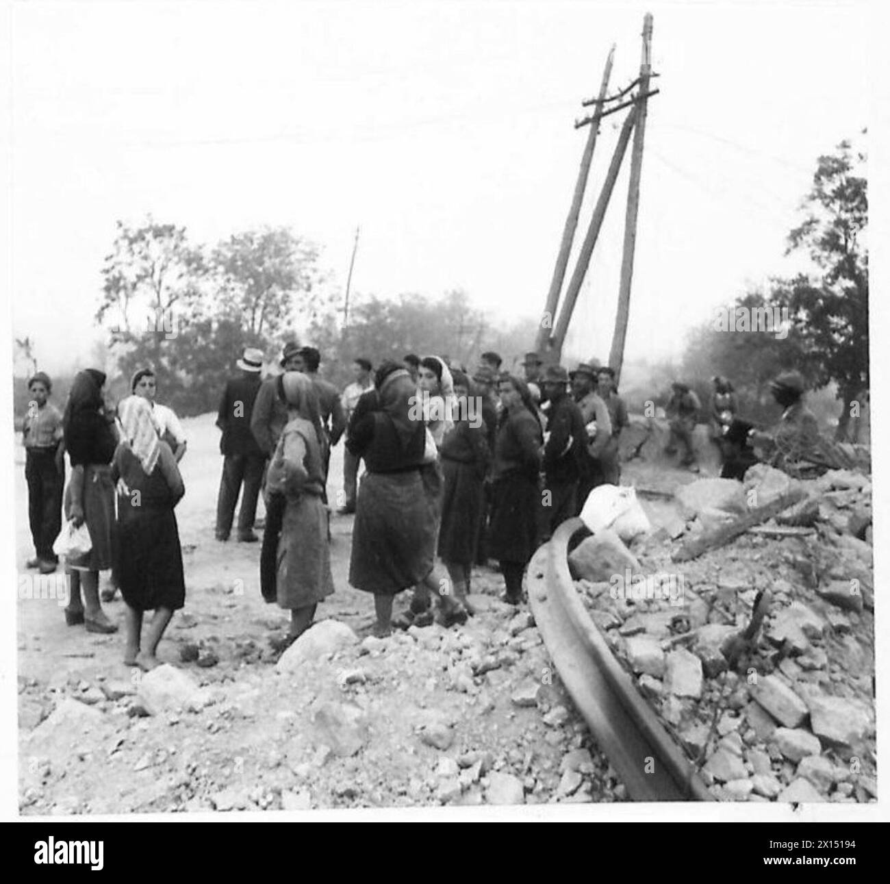 Refugees are seen awaiting transport after the Eighth Army and Allied forces begin the attack on the Gustav Line in Italy on 12 May. Stock Photo