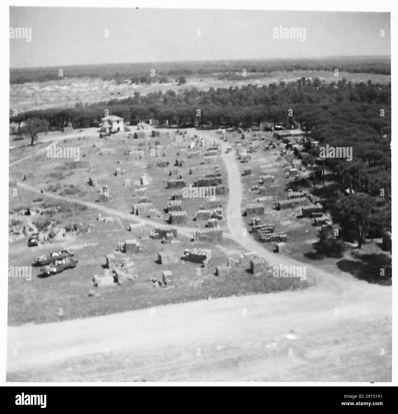 Aerial view of the Anzio bridgehead shows the Base Supply Depot and ...