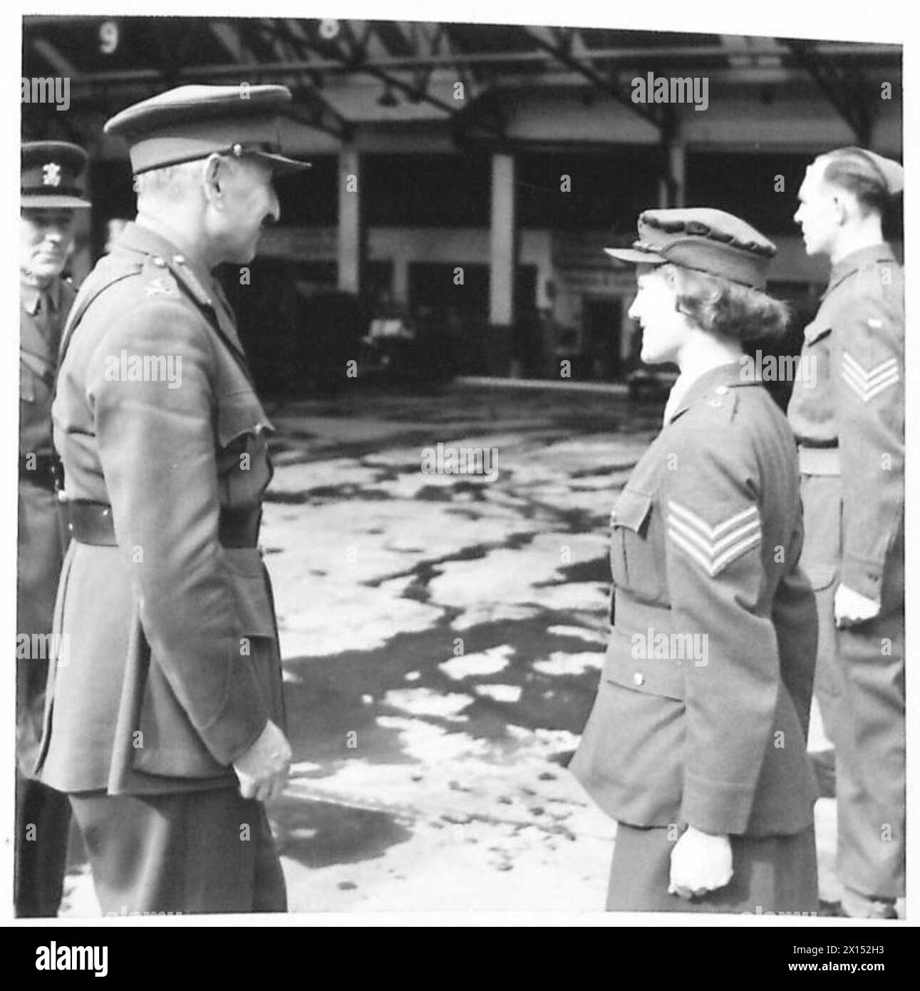 MAJOR GENERAL THE LORD BURNHAM INSPECTS