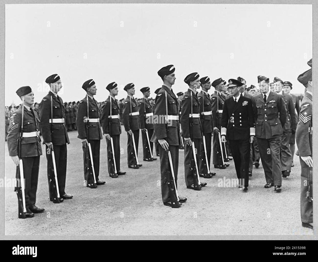 The King inspects a guard of honour of RAF aircrew personnel in the ...
