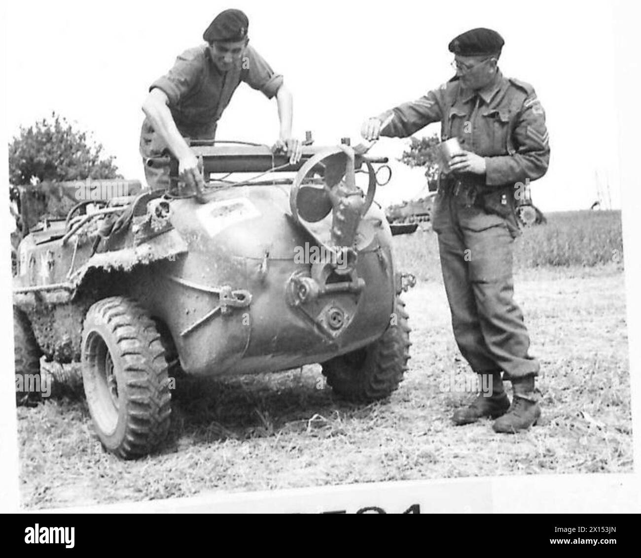 THE PEOPLES' CAR - An amphibious VOLKSKRAFTWAGEN captured by a British armoured unit from the 12th SS Panzer Division (Hitler Youth) in the fighting near Cheux has been repainted and is now being used by the regiment. 11th Armoured Division, 23rd Hussars British Army, 21st Army Group Stock Photo