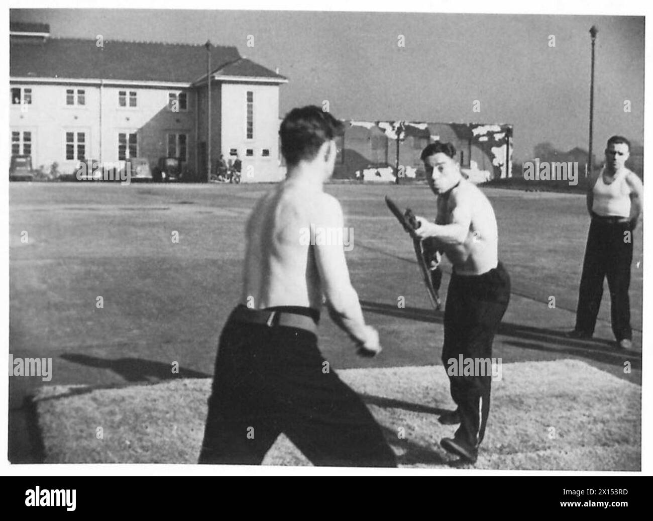 Parachute troops undergo training in unarmed combat, practicing attacks ...