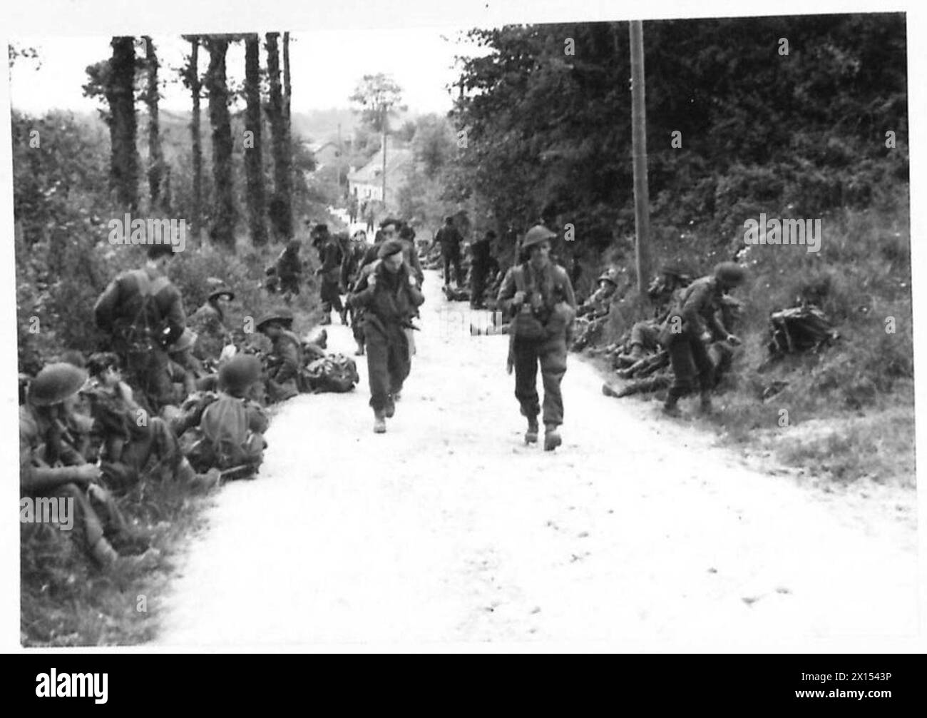 Commandos of No. 4 Commando, 1st Special Service Brigade, advance ...