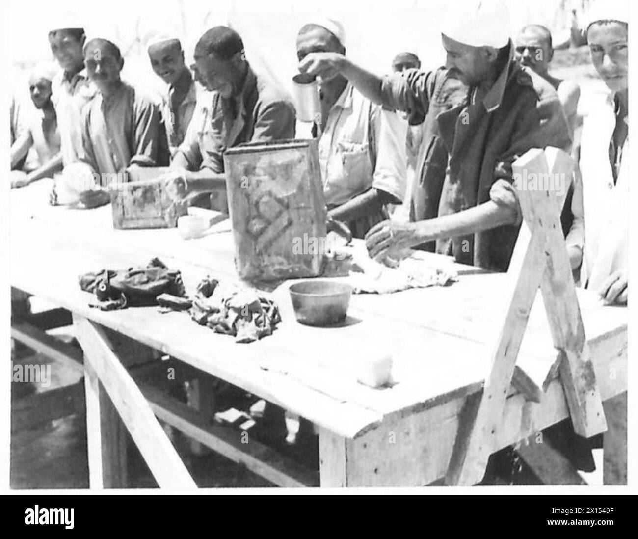 LIFE IN A LIBYAN PRISONERS' CAMP The prisoners doing their washing