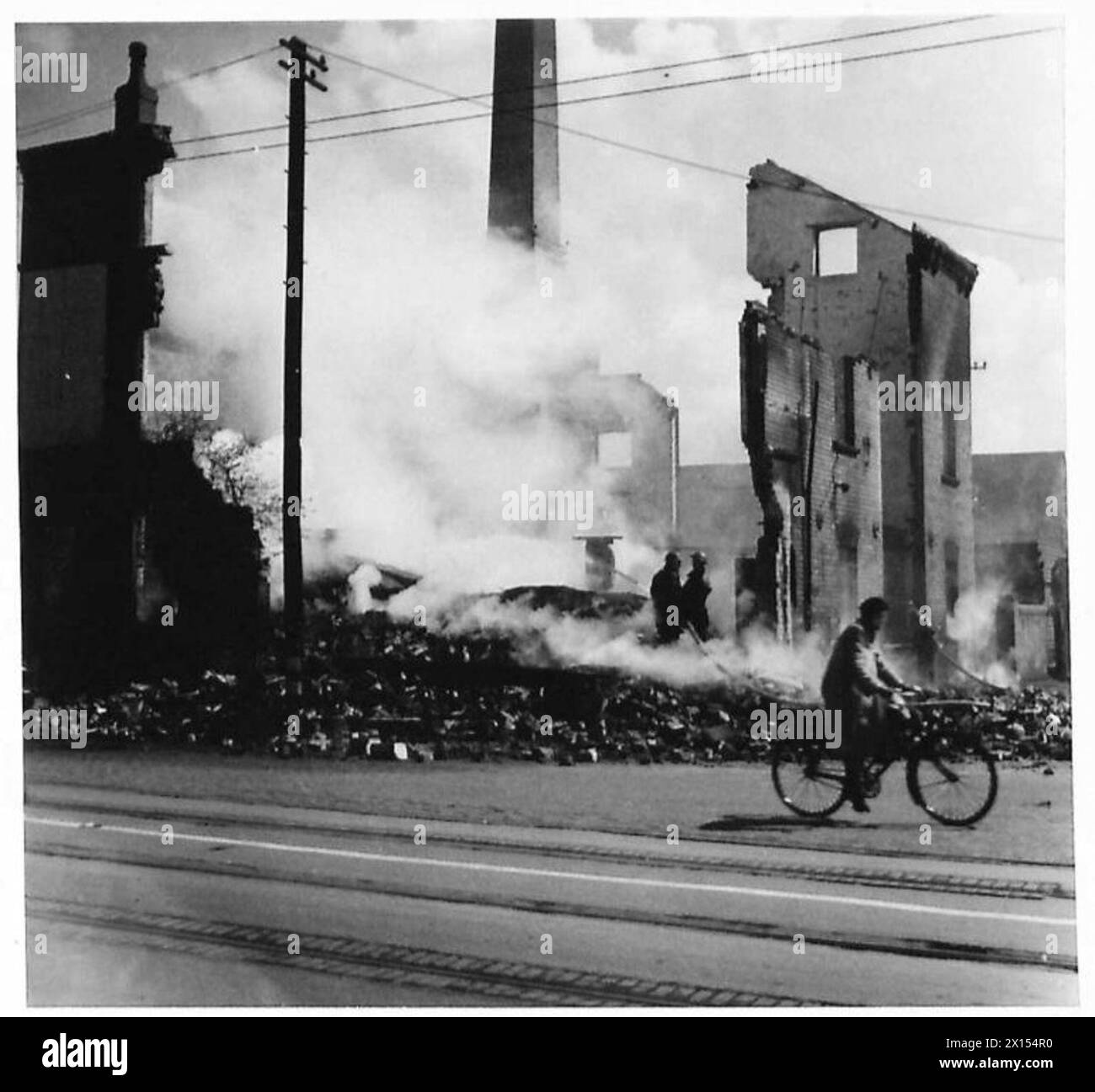 Photographs depict bomb damage affecting buildings and infrastructure ...