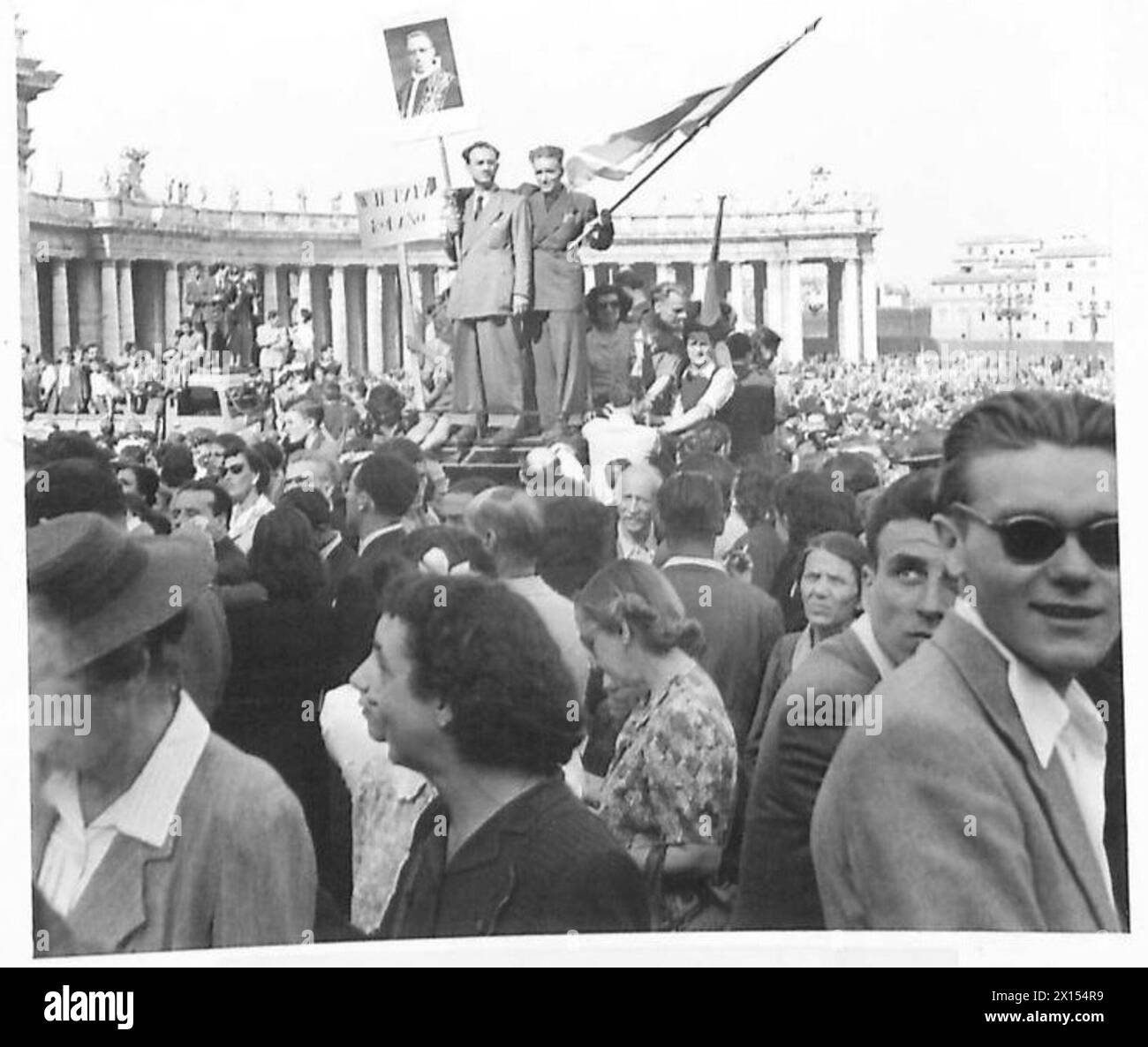 Pope Roma Flag During the liberation of Rome, crowds gather with flags, banners, and ...