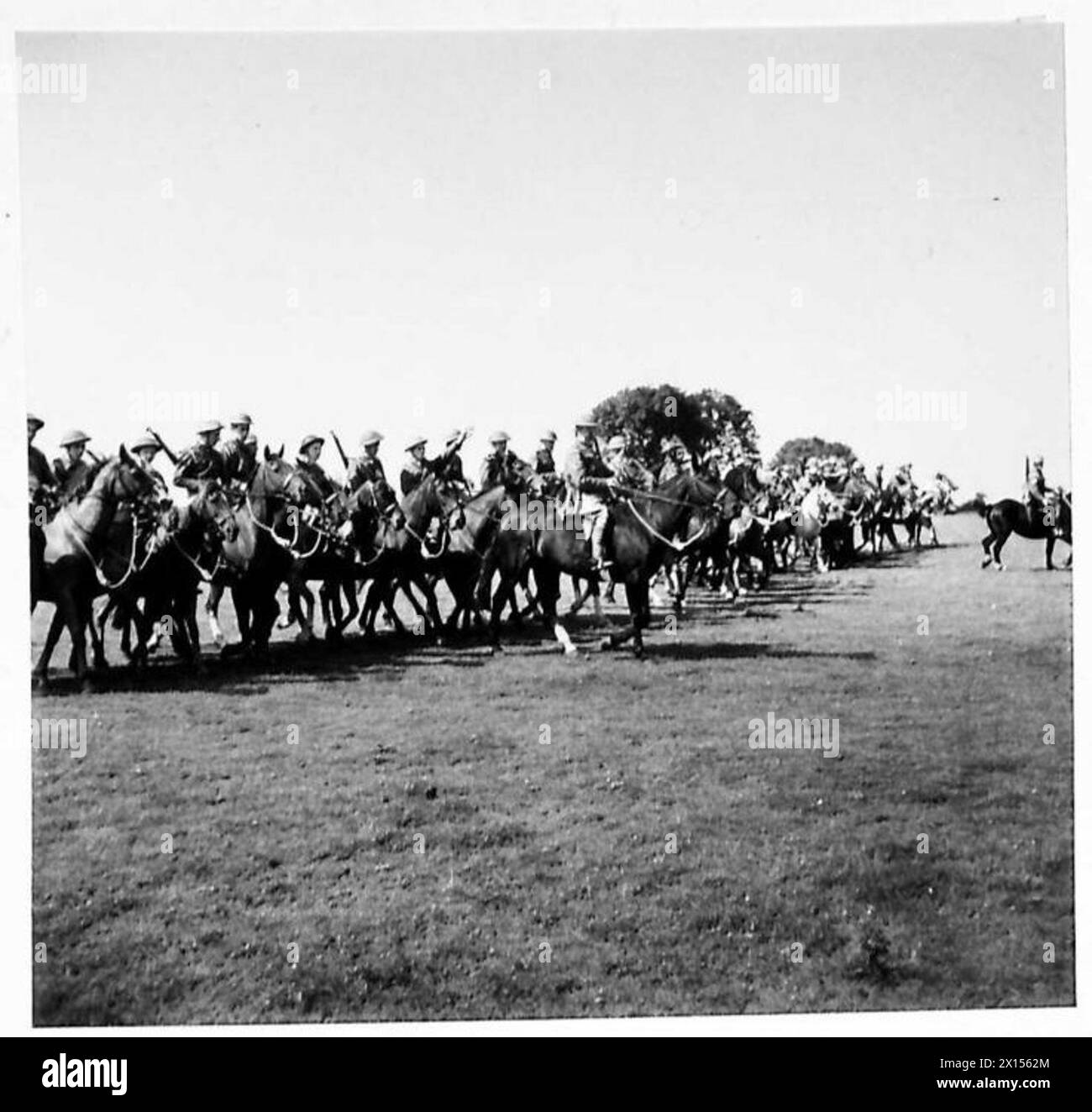 A mounted patrol departs at a steady pace for a routine exercise ...