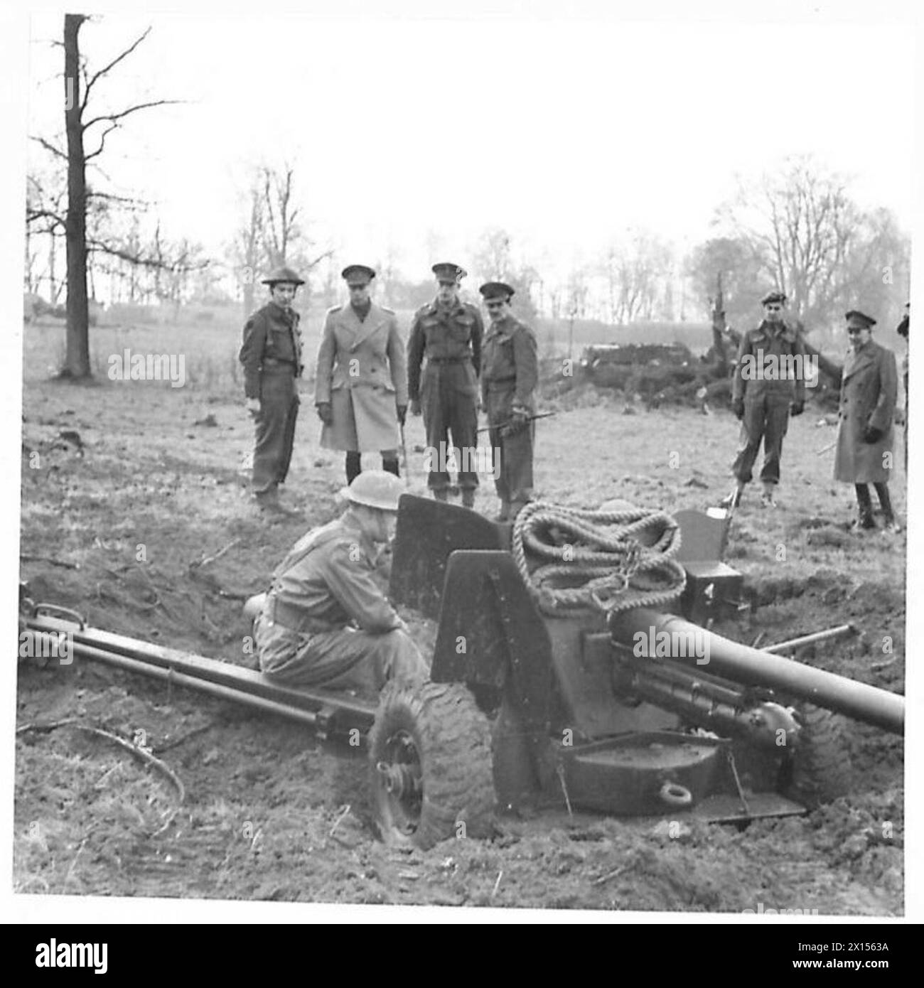 H.M. THE KING VISITS INVASION TROOPS - His Majesty watching an anti ...