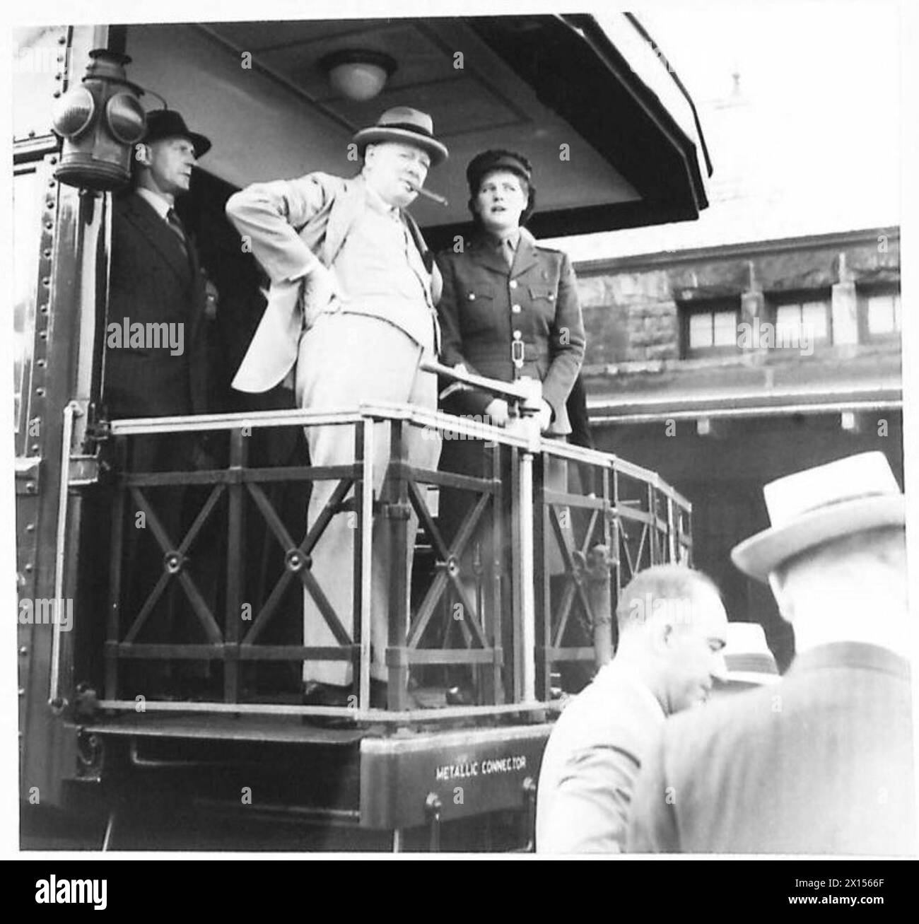 THE PRIME MINISTER AT NIAGARA FALLS - The Prime Minister and Miss Mary Churchill on the observation platform. A crowd gathered round his car before the train left British Army Stock Photo