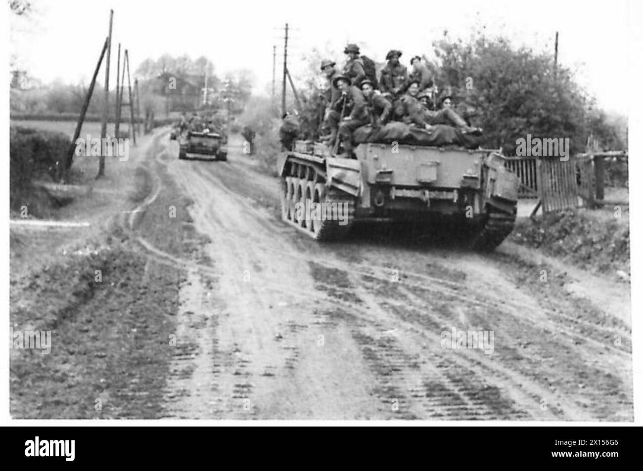 A tank column with accompanying infantry advances along the Hamburg ...