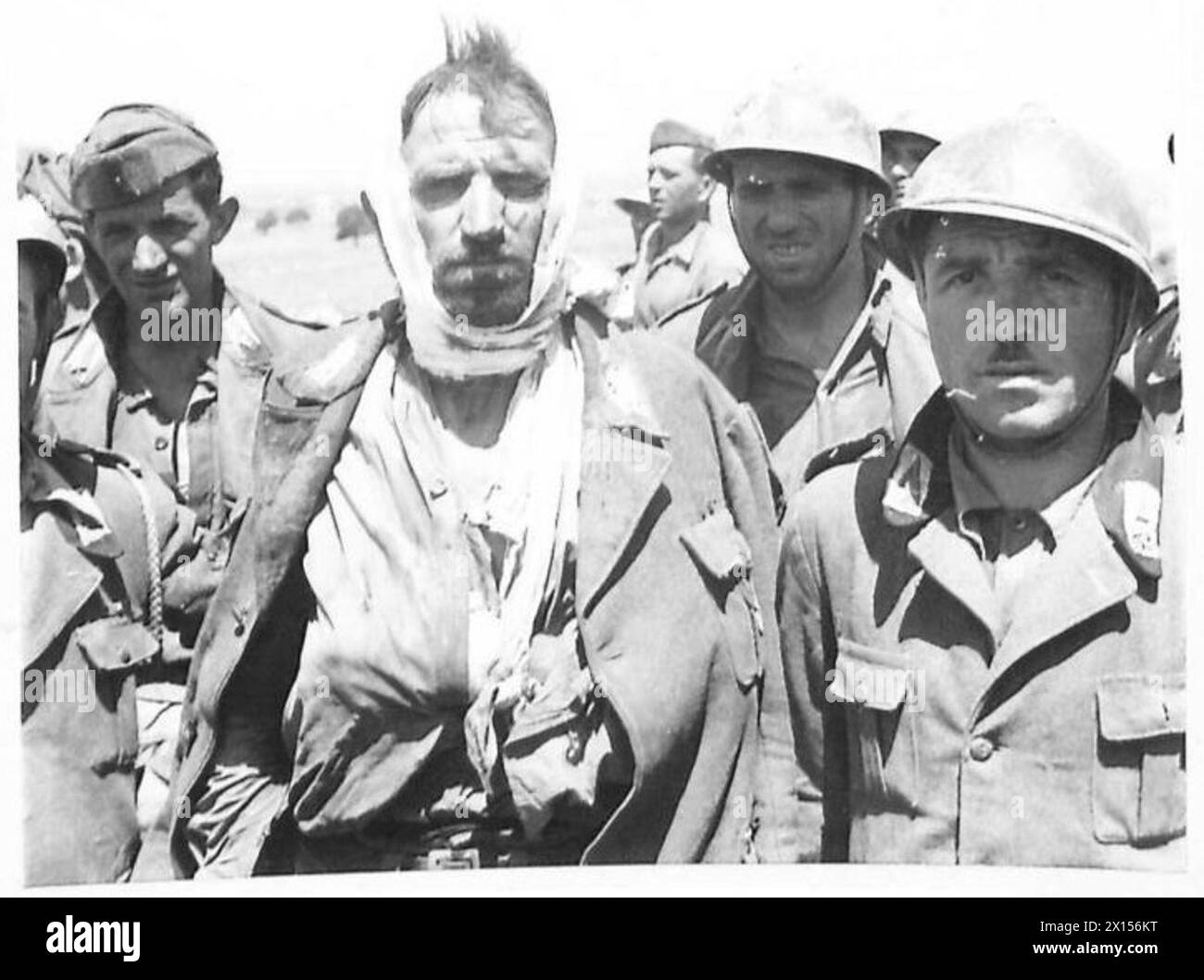 Wounded Italian prisoners are cared for by the British Army during ...