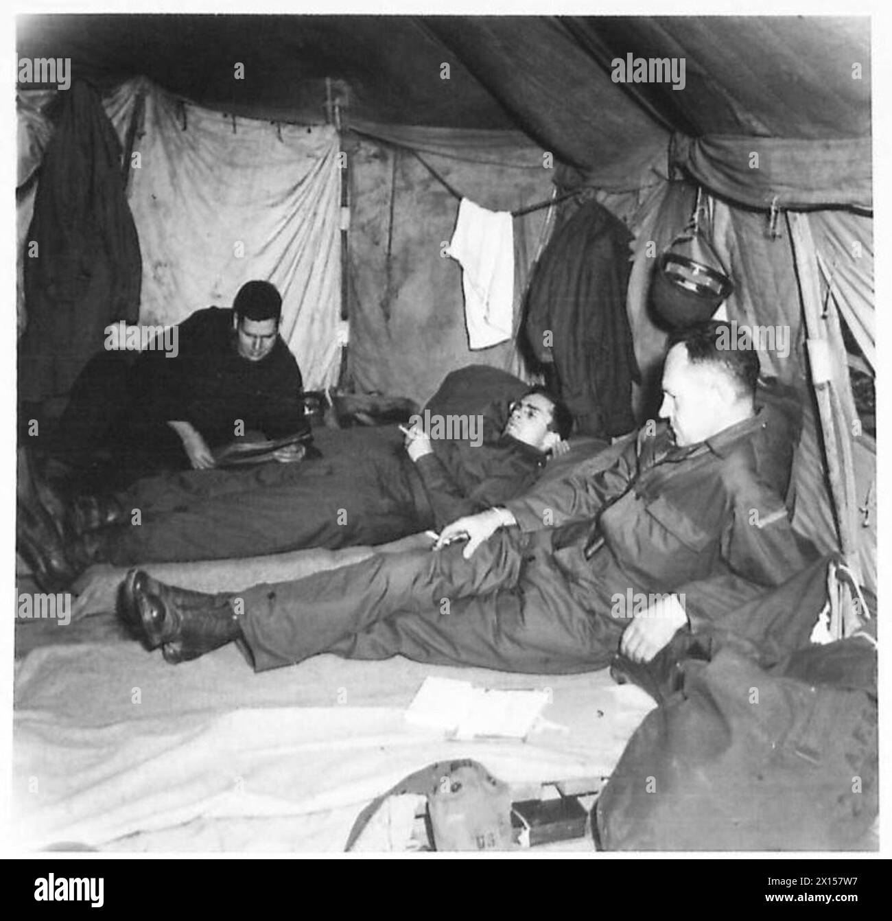 AMERICAN FIELD SERVICE WITH THE EIGHTH ARMY - All the peronnel in this Transit Camp sleep under canvas, and for many of the volunteer ambulance drivers this is their first experience of this type of life. During the grand spring weather of Italy, however, sleeping under canvas is quite enjoyable British Army Stock Photo