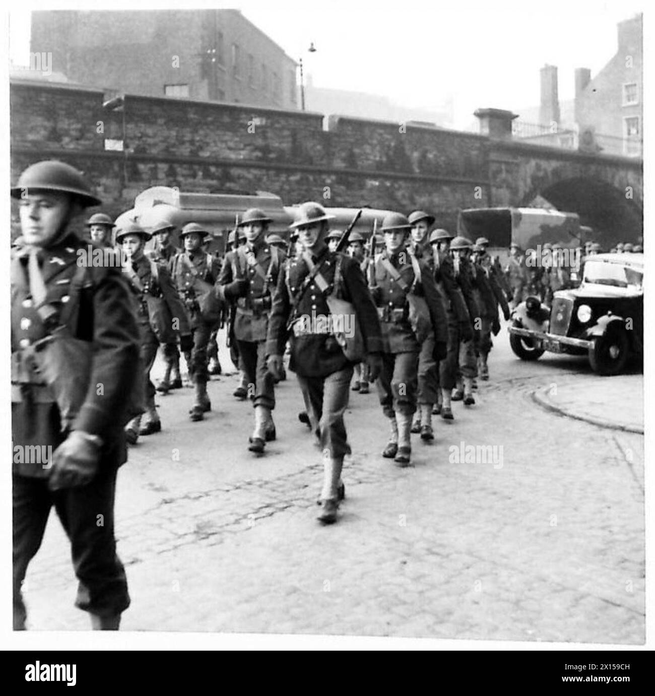 American troops conduct a ceremonial parade, marching as part of formal ...