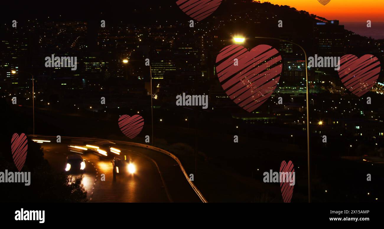 Image of red hearts falling over night cityscape Stock Photo - Alamy