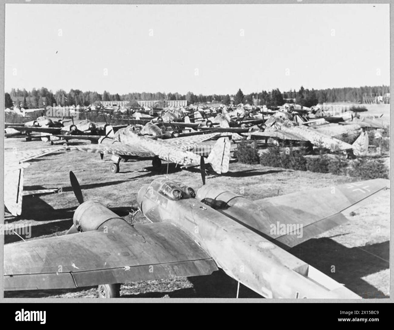 NORWAY : GROUNDED AND DEFEATED LUFTWAFFE - Picture issued 1945 shows - Luftwaffe aircraft of all types, immobilised pending Allied disposal instructions, parked on Gardermoen airfield, near Oslo, occupied by the R.A.F Royal Air Force Stock Photo