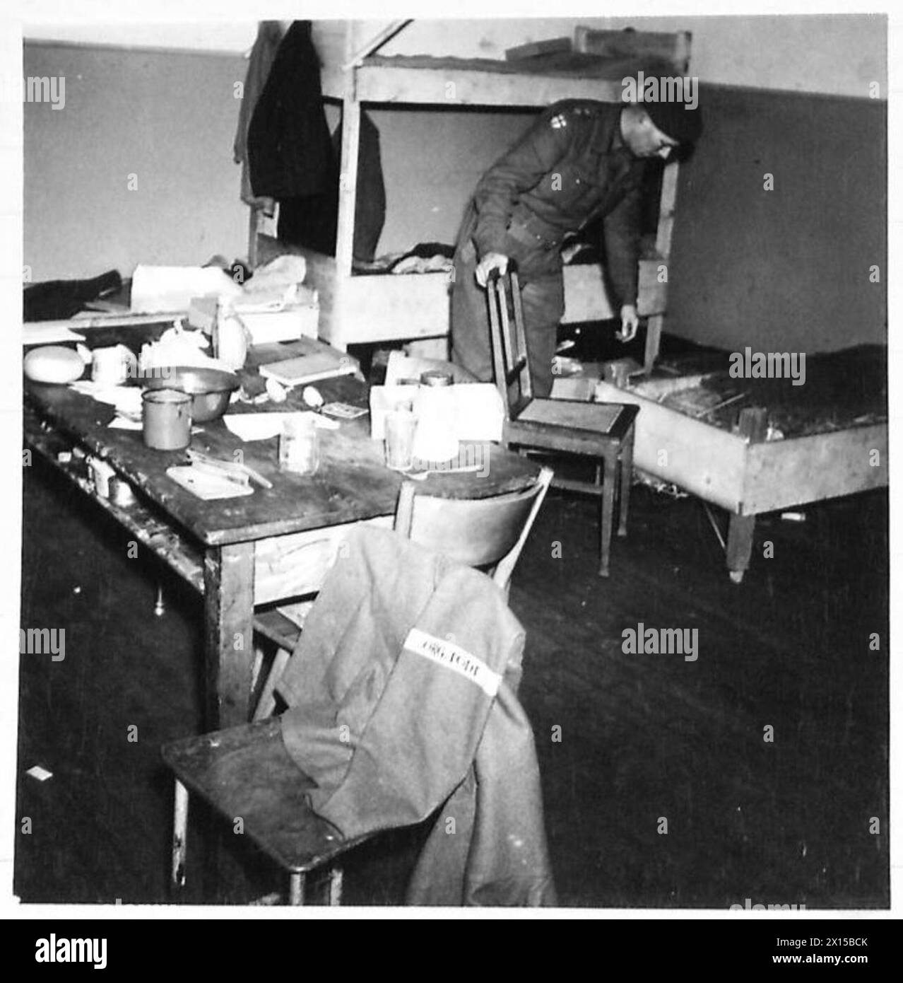 MILITARY GOVERNMENT IN RHEINE - A room in the Todt Organisation Bulding used by forced labour showing the general filthy conditions British Army, 21st Army Group Stock Photo