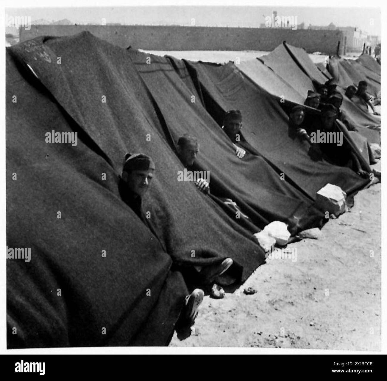 Italian prisoners of war are seen in blanket tents in the Western ...
