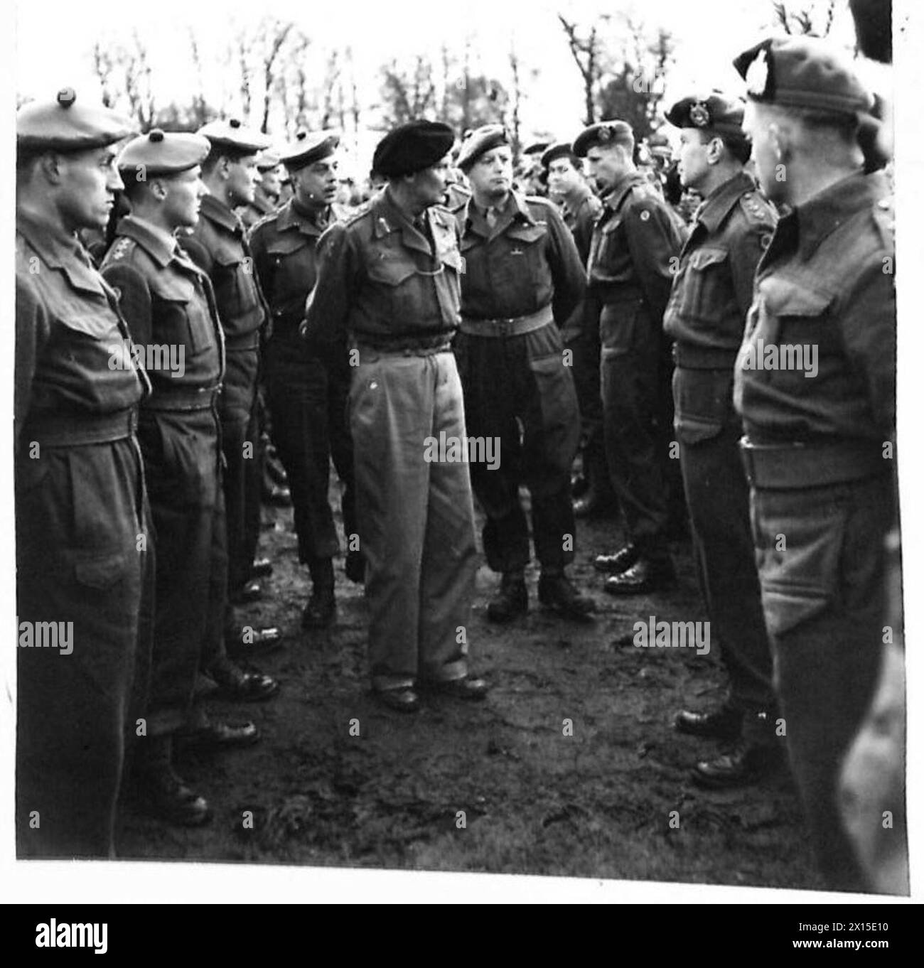 GENERAL MONTGOMERY'S TOUR OF ARMY UNITS - General Montgomery (now Field Marshal) speaking to officers of the 6th Battalion Kings Own Scottish Borders at Langholm. He is accompanied by Lieutenant Colonel J.G. Shillington.Picture taken in February 1944 during Field Marshal (then General) Montgomery's tour of the units who were massing in Britain, ready for D-Day. He travelled over 3,000 miles during this tour, and spoke to thousands of his men Stock Photo