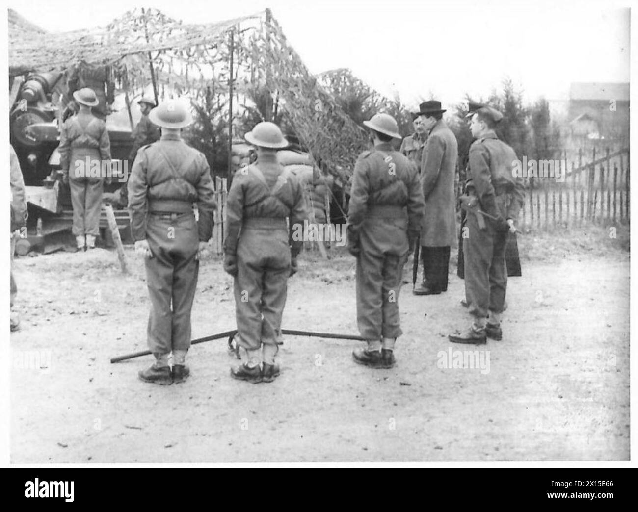 LORD CRANBOURNE INSPECTS GUN POSITIONS Lord Cranbourne watching a 9.2