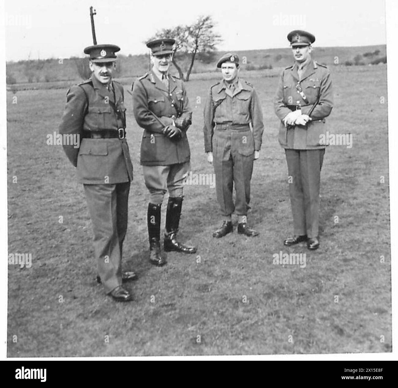 H.R.H. DUKE OF GLOUCESTER VISITS M.T. BATTALIONS IN NORTHERN COMMAND - Left to right : Lt.Col. Sir Charles McGrigor, Bt., OBE., (O.C. MT Battalion); Lt.Gen. Sir T.R. Eastwood; Captain E.H. Sargeant and HRH the Duke of Gloucester British Army Stock Photo