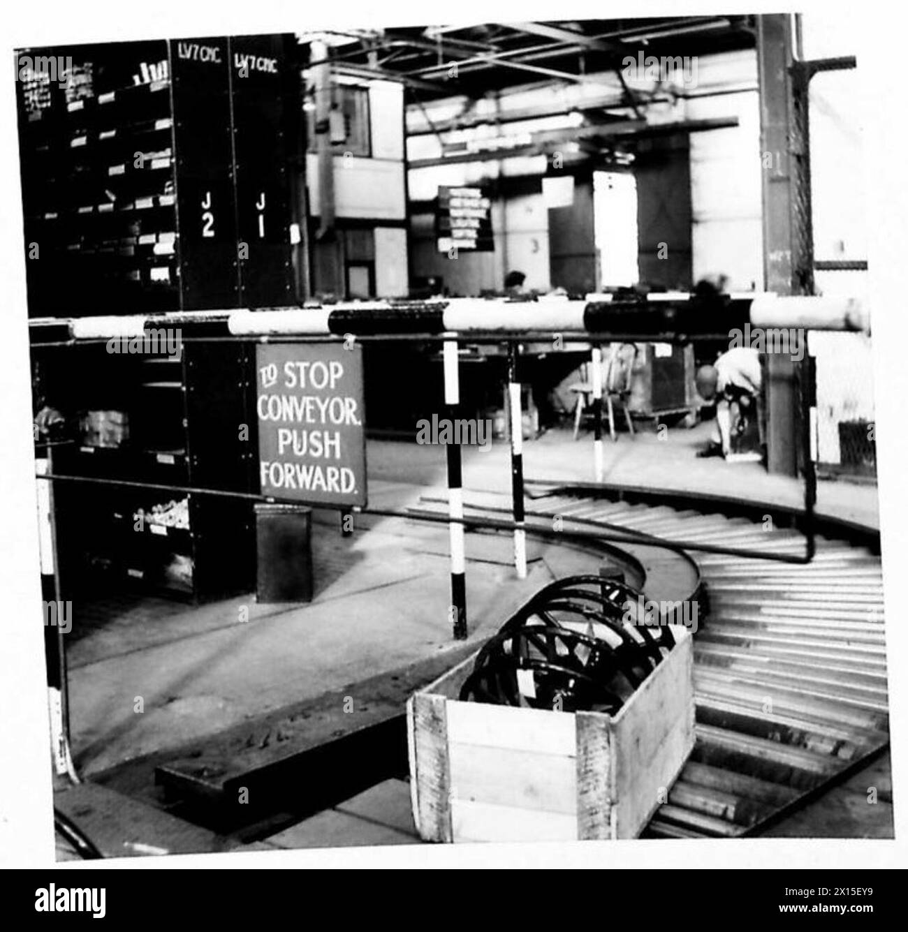 VARIOUS DEPARTMENTS AT CENTRAL ORDNANCE DEPOT, CHILWELL - Conveyor belt in the M.T. Stores. Slack conveyor belt which runs throughout the Storehouse British Army Stock Photo