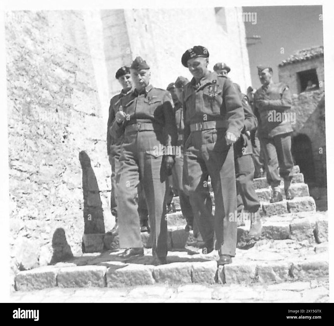 THE POLISH ARMY IN THE ITALIAN CAMPAIGN, 1943-1945 - General Kazimierz Sosnkowski, the C-in-C of the Polish Armed Forces, walking down the stairs with General Władysław Anders, the Commander of the 2nd Polish Corps, at Carpinone after a mass during his visit to the Corps, 2 April 1944 Polish Army, Polish Armed Forces in the West, Polish Corps, II, Polish Armed Forces in the West, Carpathian Rifles Divisior, 3, 8th Army, Sosnkowski, Kazimierz, Anders, Władysław Stock Photo