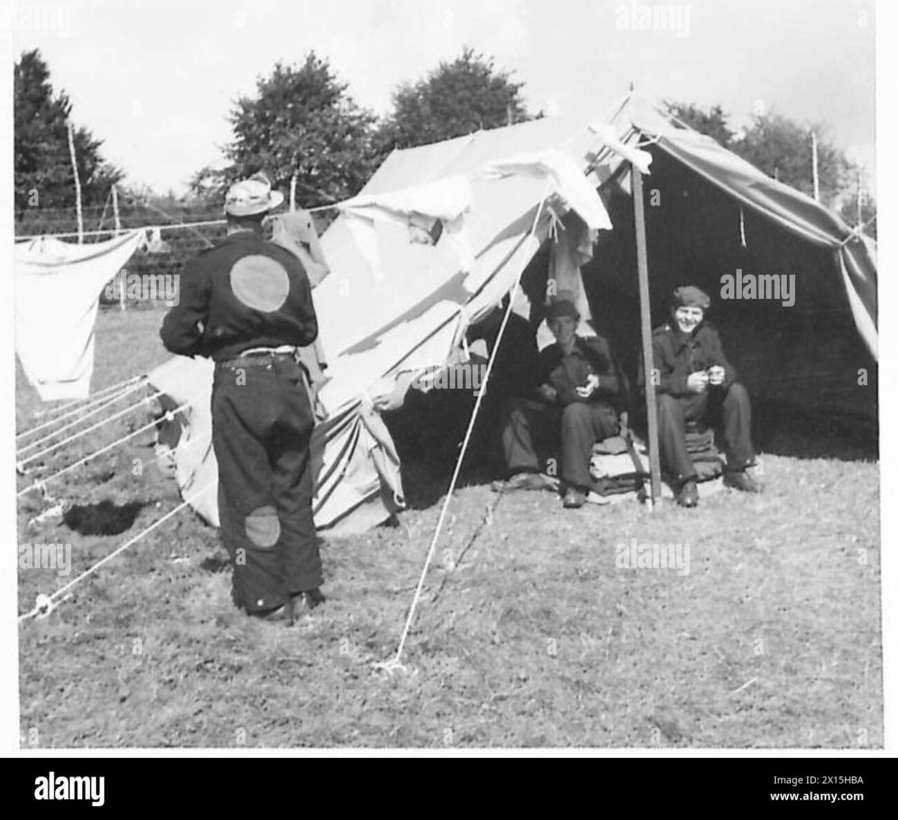 Italian prisoners of war are shown in camp life, illustrating daily ...