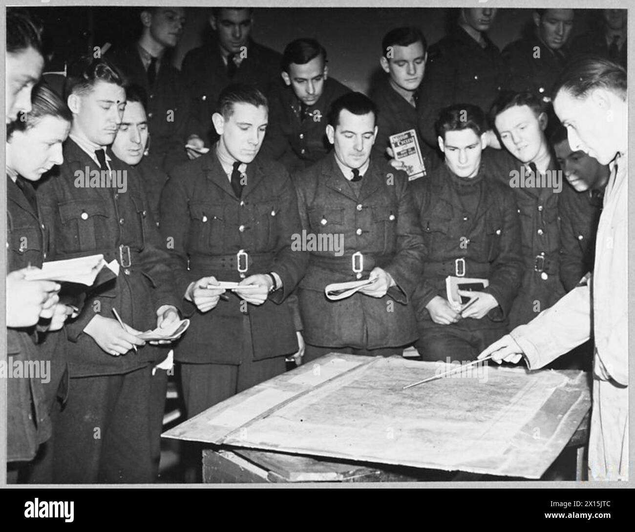 RAF motorcyclists trainees receive instruction in map reading and ...