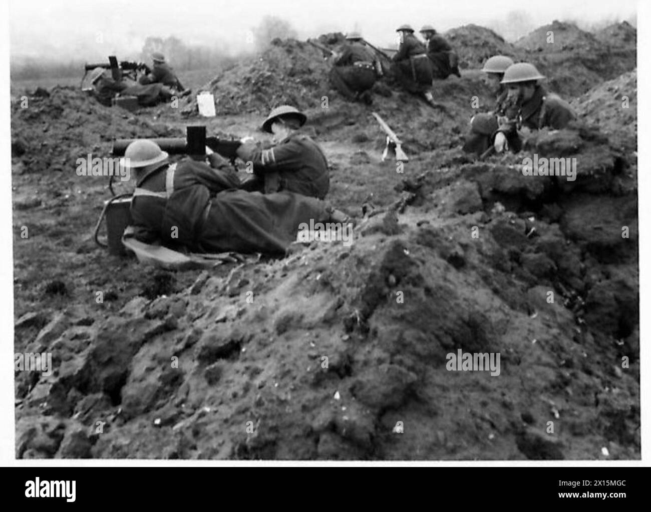 Two Home Guard machine gun sections operate American Browning guns ...
