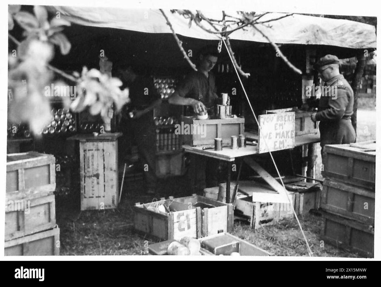 Damaged boxes of Compo Rations are being repacked by the RASC at the ...