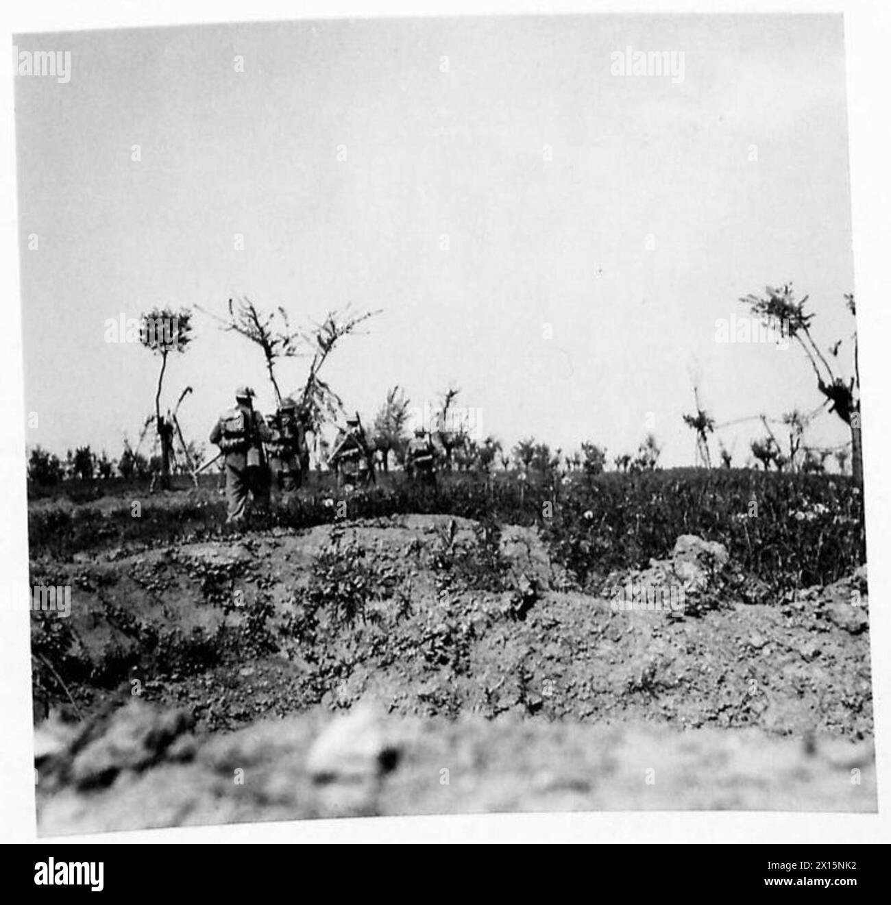 Eighth Army Inprocessing Infantrymen of the Eighth Army advance in single file through an ...