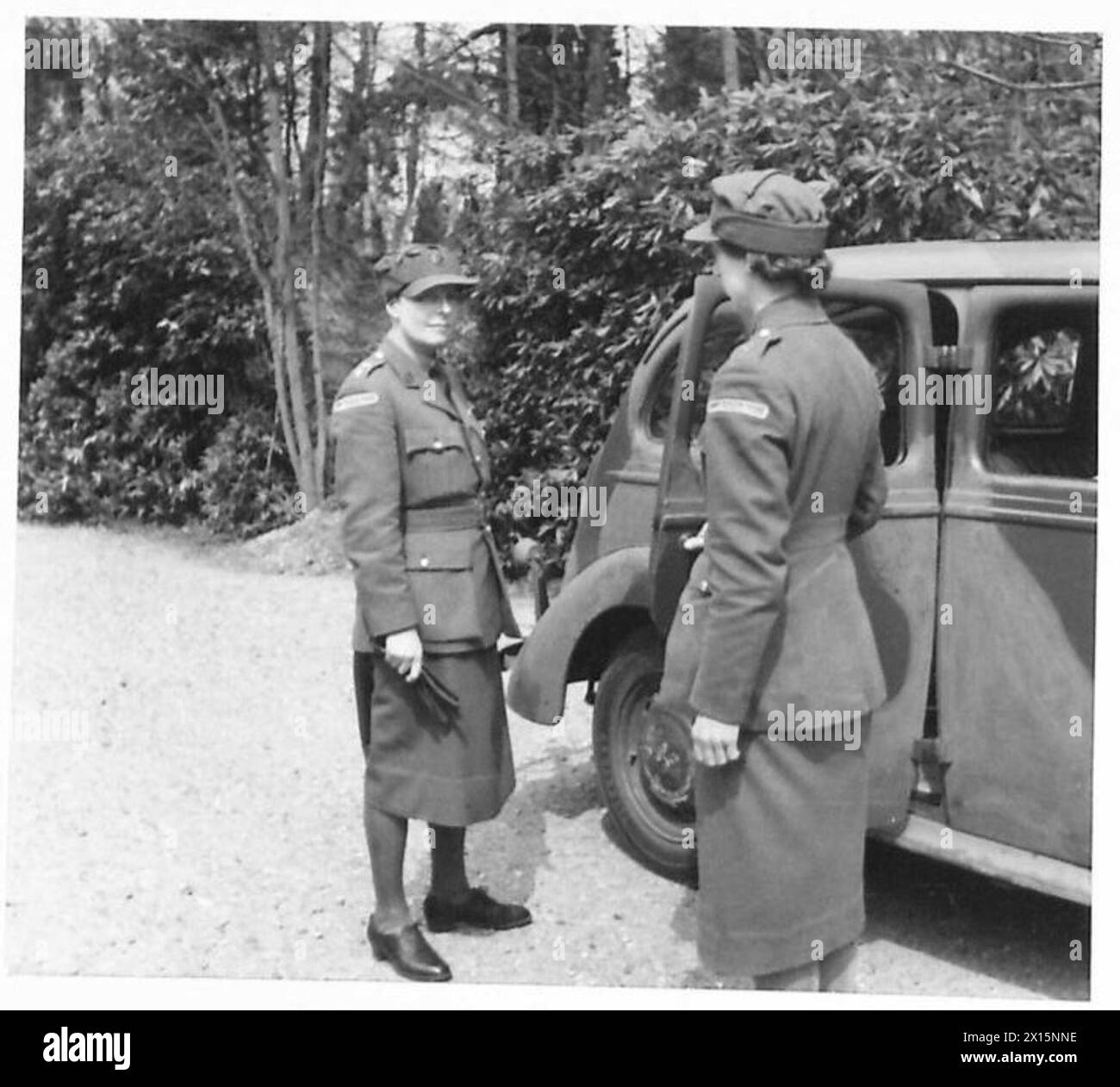 A.T.S. (Auxiliary Territorial Service) girls are shown in training ...