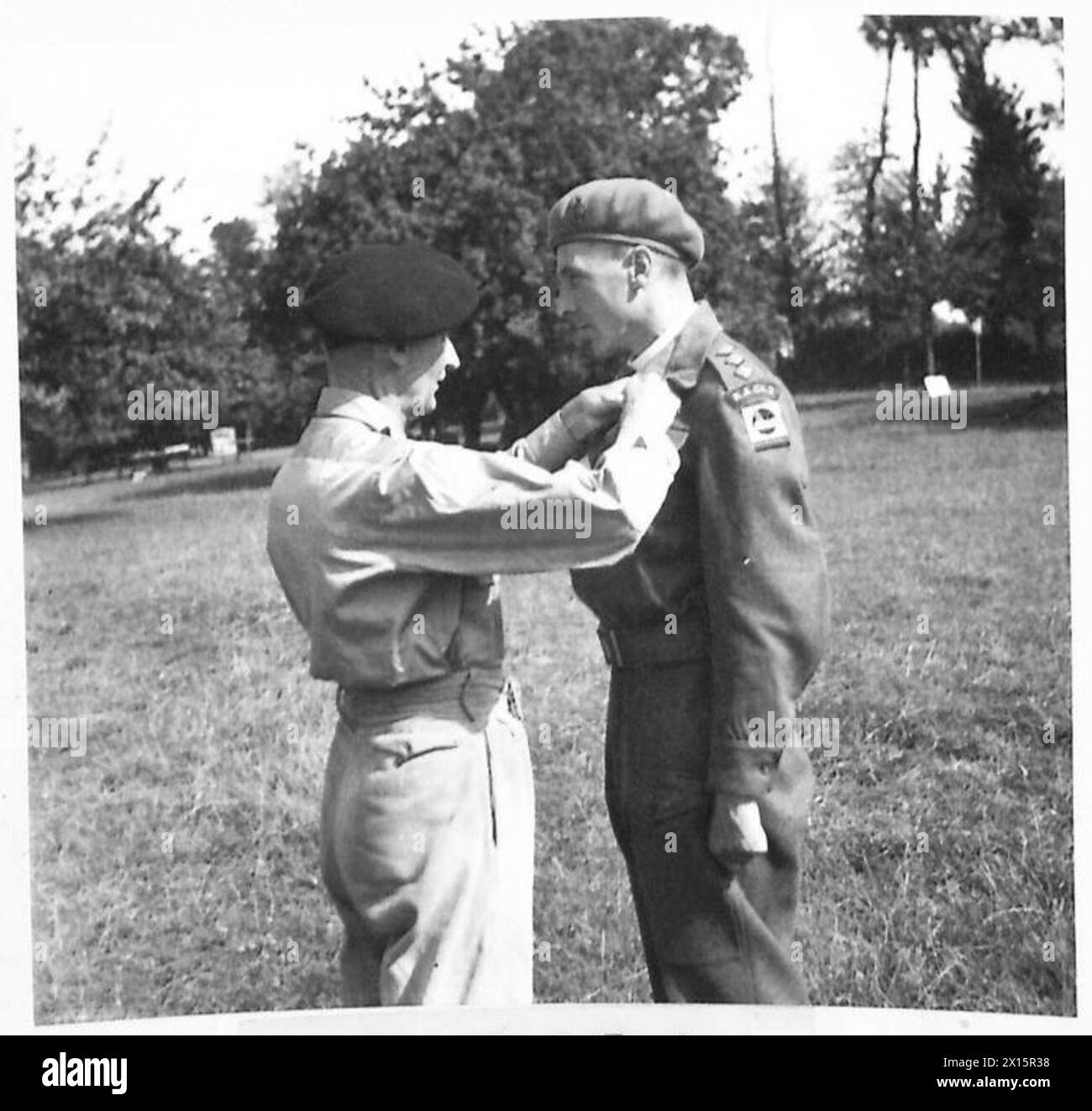 General Montgomery awarded the Military Cross to Captain W.R. Thomas, a ...