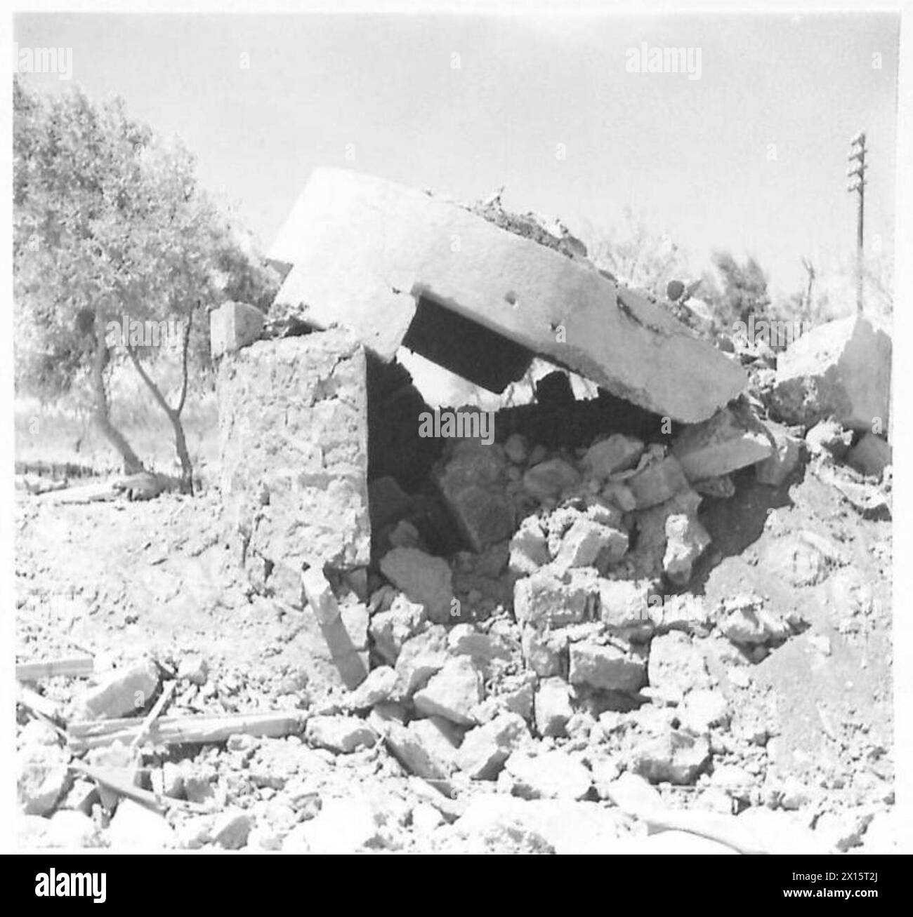 INVASION OF SICILY - Demilished blockhouses which were part of the defence system destroyed by our paratroops (ref.4880 and 4881). Subsequently identified as the typical concrete small Italian emplacement for a single light weapon, likely south of Catania British Army Stock Photo