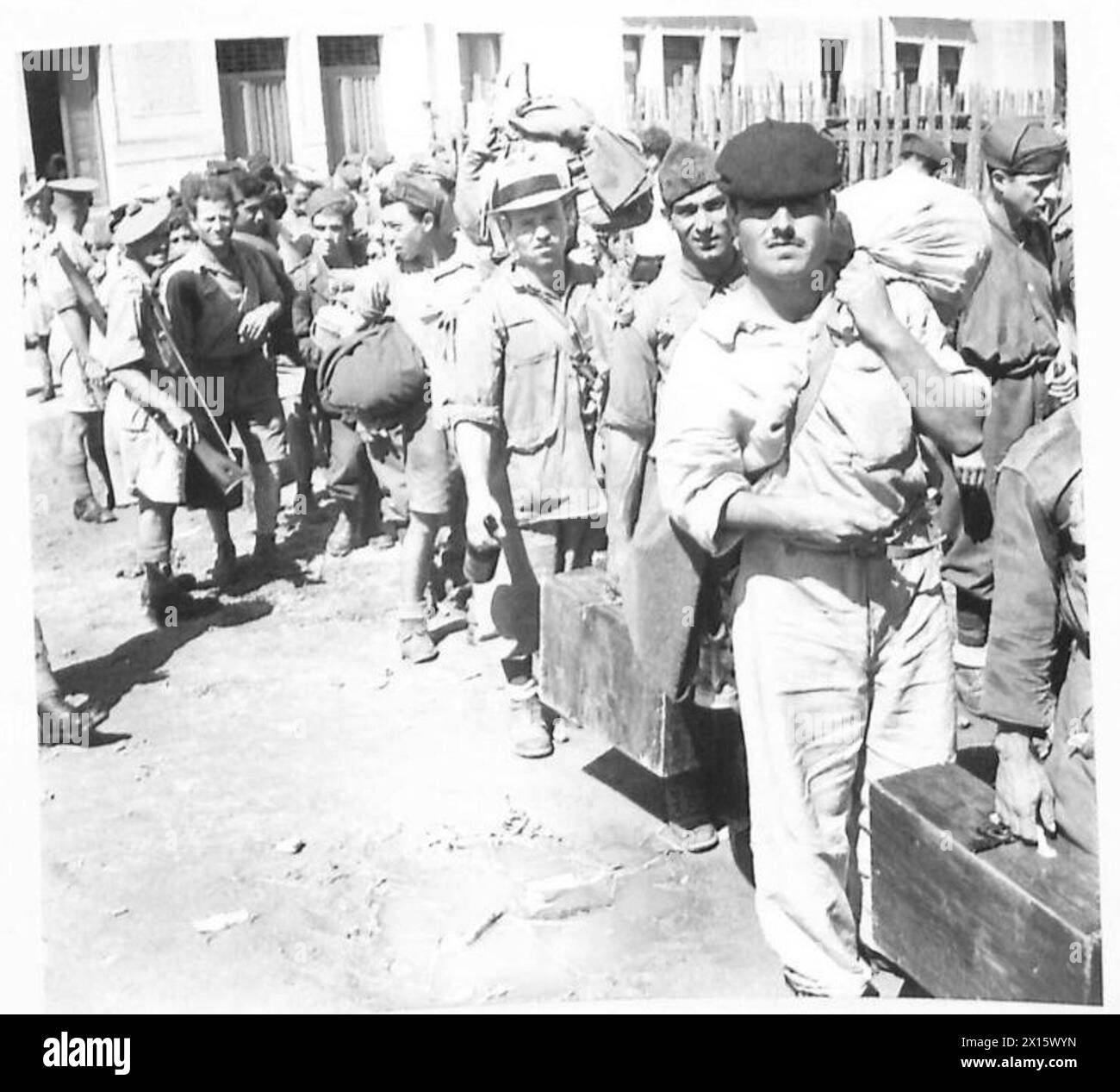 Italian prisoners are entering a prisoner of war cage at Catona under ...
