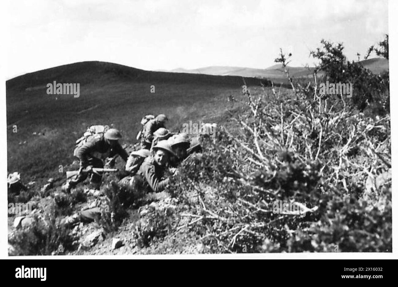 BATTLE EXERCISES in TUNISIA - Troops climbing the side of the ravine ...
