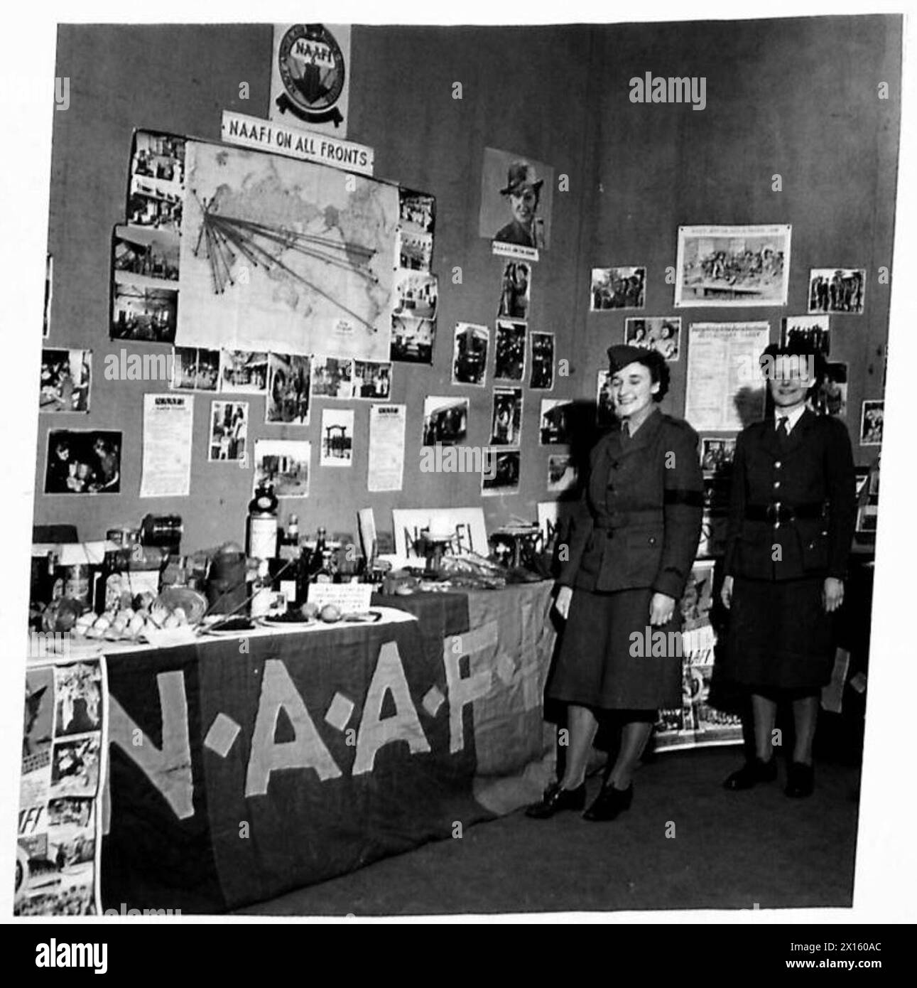 THE ARMY EXHIBITION AT SOUTHAMPTON - The NAAFI have a stand showing what they supply to troops. Also a map indicating where the NAAFI organisation is to be found in all theatres of war British Army Stock Photo