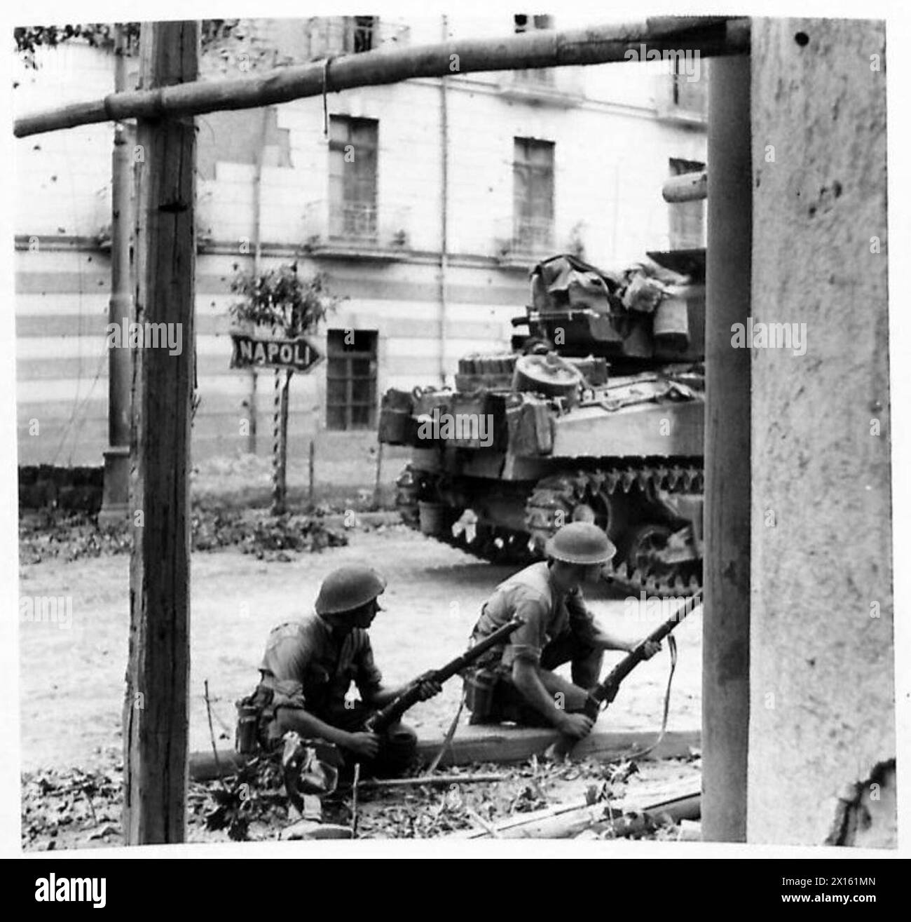 Troops of the 5th Battalion Hampshires occupy positions in the streets ...