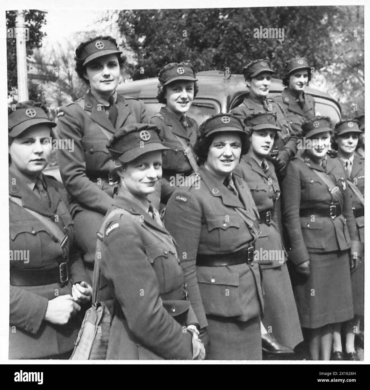 THE POLISH ARMY IN BRITAIN, 1940-1947 - Diana Napier was a well known actress and wife of Richard Tauber, the Austrian-born opera singer, in her private life. Diana Napier (second from the right, front row), a section commander of the First Aid Nursing Yeomanry (FANY) unit attached to the 1st Polish Corps, with some members of her unit at Cupar, 1 June 1941 British Army, British Army, First Aid Nursing Yeomanry, Polish Army, Polish Armed Forces in the West, 1st Corps, Napier, Diana Stock Photo