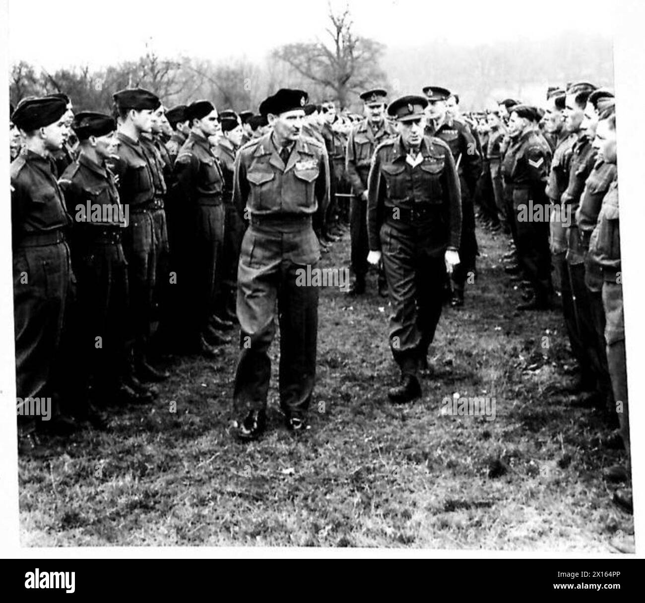 GENERAL MONTGOMERY'S TOUR OF ARMY UNITS - The C-in-C walking through the ranks of R.A.S.C., Maidstone. He is accompanied by Brigadier S.O.Jones, OBE.,DSO., followed by Major General R.K. Ross, DSO.,MC., and Lieutenant General N.M. Ritchire, CBE.,DSO.,MC British Army Stock Photo