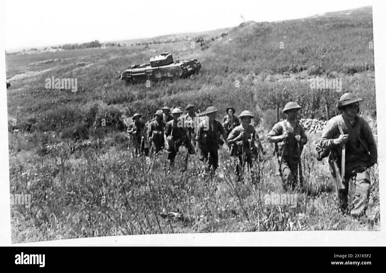 FIRST ARMY ATTACK ON LONGSTOP HILL Infantry moving up for the attack