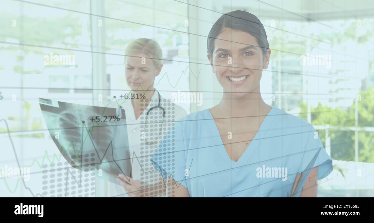 Image of statistics and financial data processing over female doctors Stock Photo
